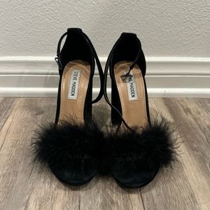 Black heels with feathers